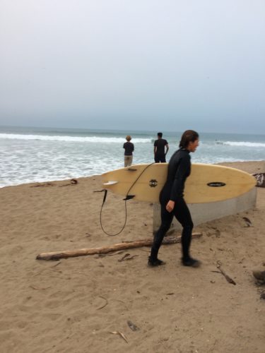 surfing at the beach